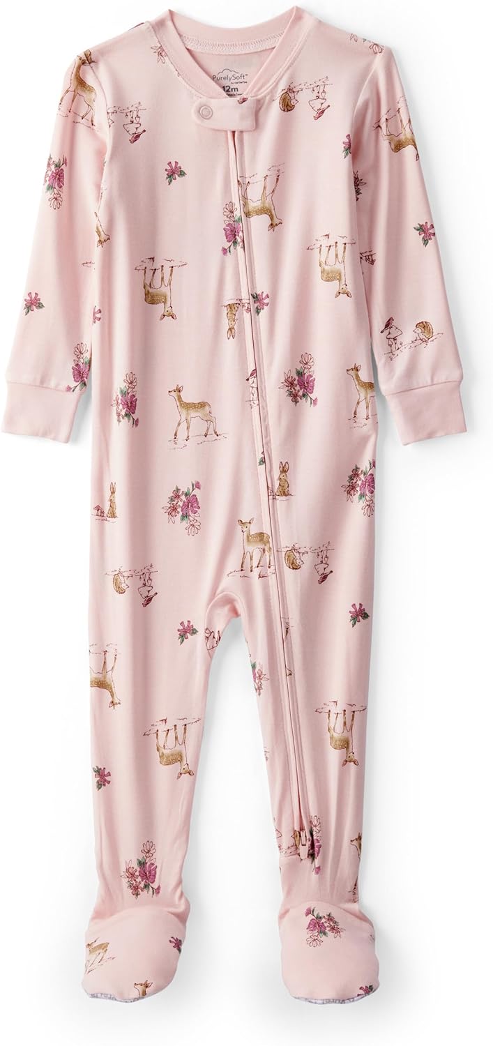 Baby girl wearing Carters footies in a cozy nursery setting